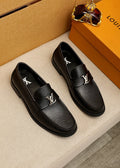 Louis Vuitton Black Leather Buckle Loafers — hero