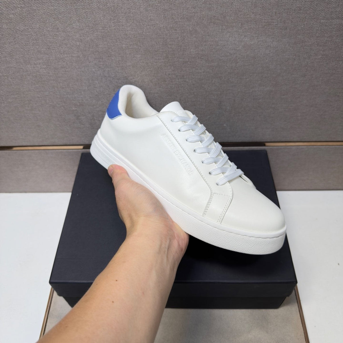 Armani Exchange Contrast Heel Low-Top Sneakers — model