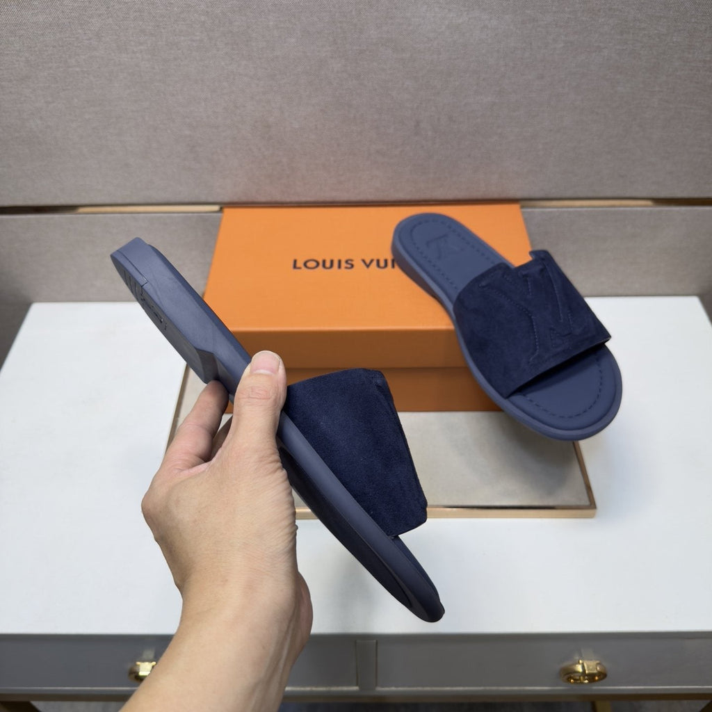 Louis Vuitton Embossed Strap Slide Sandals — model